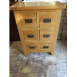 A modern Oak six drawer chest 94 cm tall 67 by 40