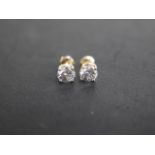 A pair of 14ct yellow gold diamond earrings total estimated 1.16ct, marked 14K, with screw stud