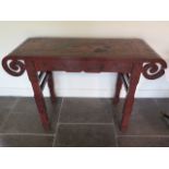 A Chinese 18th / 19th century lacquer altar table decorated with panels depicting scholars and