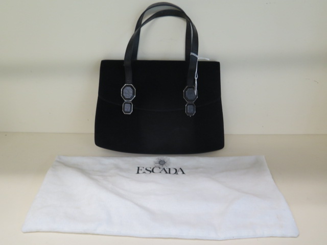 An Escada black suede handbag with pink lining, 31cm wide, in good condition with outer bag