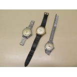 Three gents wristwatches Guda super automatic- running, Smiths Empire manual - not running and a