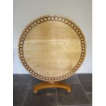 A new 19th century style yew and oak inlaid maple circular tilt top breakfast table made by a
