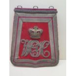 A red leather uniform pouch, 33cm x 28cm, wear to velvet and edges otherwise reasonably good