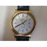 An Omega Geneve gold plated gents manual wind wristwatch with date on a black leather strap, 36mm