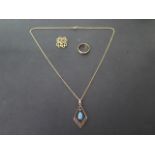 A 9ct necklace and pendant, a 9ct band ring size J/K, and a 9ct brooch 16mm wide, total weight