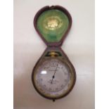 A Pillisher compensated pocket barometer, 5cm diameter, in original case, working when tested