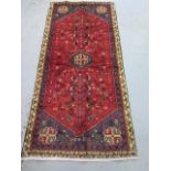 A hand knotted woollen Yallameh rug, 2.00m x 1.50m, in good condition