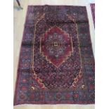 A hand knotted woollen Bijar rug, 1.95m x 1.30m, in good condition
