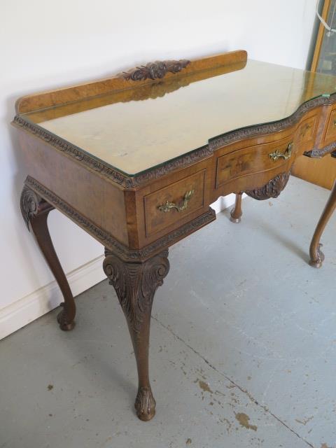 A walnut three drawer serpentine fronted table on acanthus carved cabriole legs, 90cm tall x 114cm x - Image 4 of 4