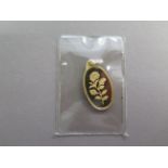 A Suisse 5g fine gold 999.9 pendant in good condition