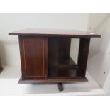 An Edwardian mahogany inlaid table top revolving bookshelf, 33cm tall x 39cm x 39cm, in generally