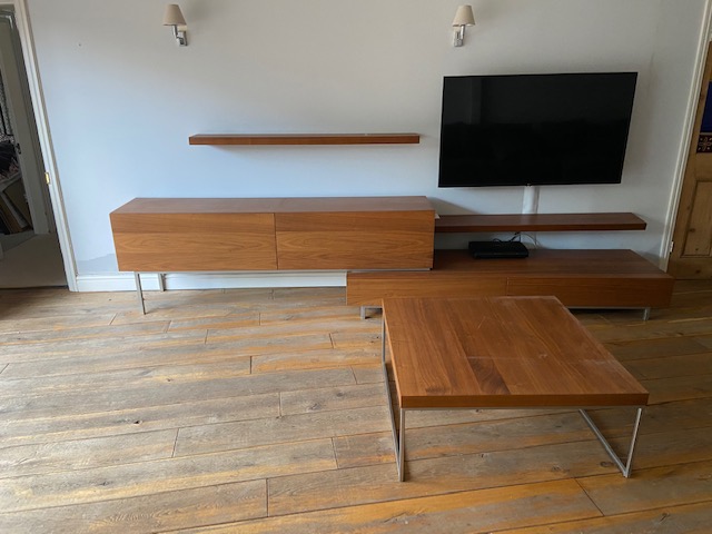 A Designer Teak effect four drawer TV stand sideboard with coffee table and two wall shelves . The s