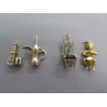 Two 14K yellow gold charms, approx 5.2 grams and two other gilt charms, not marked, approx 8.4 grams