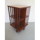 A mahogany revolving bookcase, 73cm tall x 41cm x 41cm, in generally good condition