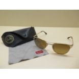 A pair of Ray-ban signet polarized sunglasses 3429, gold colour frames, with case and cloth, in good