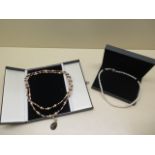 A Compton and Woodhouse smokey quartz and pearl necklace, 51cm long with a 10K gold clasp and a