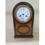 A 19th century French mantle clock 8 day movement rosewood case with shell inlay white dial with