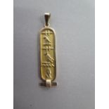 An 18ct yellow gold Egyptian pendant, 4.5 cm long, approx 3.8 grams, good condition