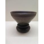 A Chinese hair glaze bowl possibly Song dynasty on an associated stand, bowl 7cm tall x 12cm