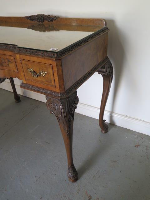 A walnut three drawer serpentine fronted table on acanthus carved cabriole legs, 90cm tall x 114cm x - Image 3 of 4