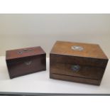 A Georgian mahogany tea caddy 24cm wide and a Victorian walnut travel box, 31cm wide, both with some