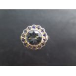 A 9ct yellow gold aqua marine and sapphire ring, size L 1/2, head size 13mm, in good condition