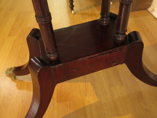 A 19th century mahogany foldover card table on four pillar support and splayed legs on brass hairy - Image 4 of 5