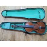 A French halfsize violin with a two piece 12 1/4" back with label Lutherie Artistique M.