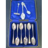 A set of six silver teaspoons box, a silver sifter and two other silver spoons, weight approx 5 troy