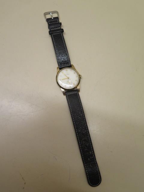 A Cyma 9ct gold Cymaflex manual wind wristwatch with 30mm case on a black leather strap, running and - Image 2 of 5