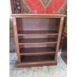 An early 20th century mahogany bookcase with three adjustable shelves, 112cm tall x 92cm x 29cm,