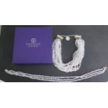 A Hoorieh Coish hallmarked silver multi-strand rock crystal necklace, boxed, 47cm long and a similar
