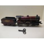 A Bassett-lowke 0 gauge tinplate clockwork 4-4-0 loco and tender 1927 Duke of York, original