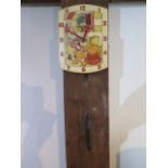 A novelty Noddy wallclock with a nodding Noddy, 19cm x 14cm, in running order with a single weight