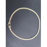 A 14ct yellow gold necklace marked 14KT ITALY, 45cm long, approx 28 grams, set with small stones