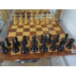 A French Lardy International weighted wooden chess set, king height 10.5cm tall, with box and