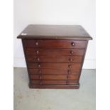 A seven drawer mahogany collectors cabinet, 51cm tall x 45cm x 27cm