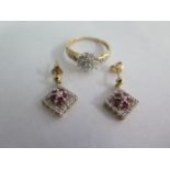 A pair of 9ct gold earrings and a 9ct gold ring, size N, total approx weight 4.5 grams, in good