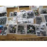 A collection of painted, part painted and unpainted Games Workshop and other plastic figures