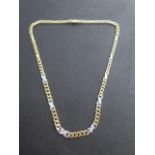 An 18ct yellow and white gold hallmarked diamond necklace, 46cm long, approx weight 35.2 grams, in