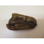 A Chinese 19th century jade carving of a tree squirrel, 7cm x 4cm, in good condition, a Chinese 19th