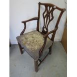 A Georgian mahogany chair with later yew wood arms with a overstuffed needdlepoint seat, 93cm tall x