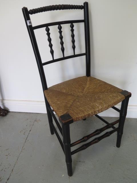 A 19th century William Morris style Sussex Chair, 87cm tall