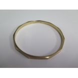 A 9ct yellow gold hallmarked bangle, 7.5cm external, approx 13 grams