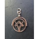 A gilt metal Masonic revolving fob believed to be 9ct but not hallmarked, approx 2 grams, in good