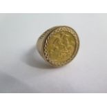 A George V gold full sovereign dated 1912 in a hallmarked 9ct ring mount, size W, approx 13.5 grams