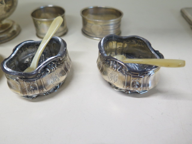 A pair of Continental silver salts, two silver napkin rings (one damaged), a silver bowl, coin - Image 3 of 4