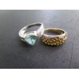 An 18ct white gold ring, size N, and an 18ct yellow gold ring, size N, both hallmarked and good