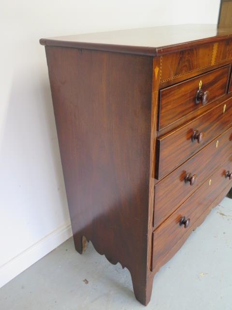 A 19th century mahogany five drawer chest with an inlaid frieze on bracket feet united by a shaped - Image 4 of 6