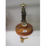 A Franz Hermie skeleton type mantle clock striking on a bell, 26cm tall with key, running order,